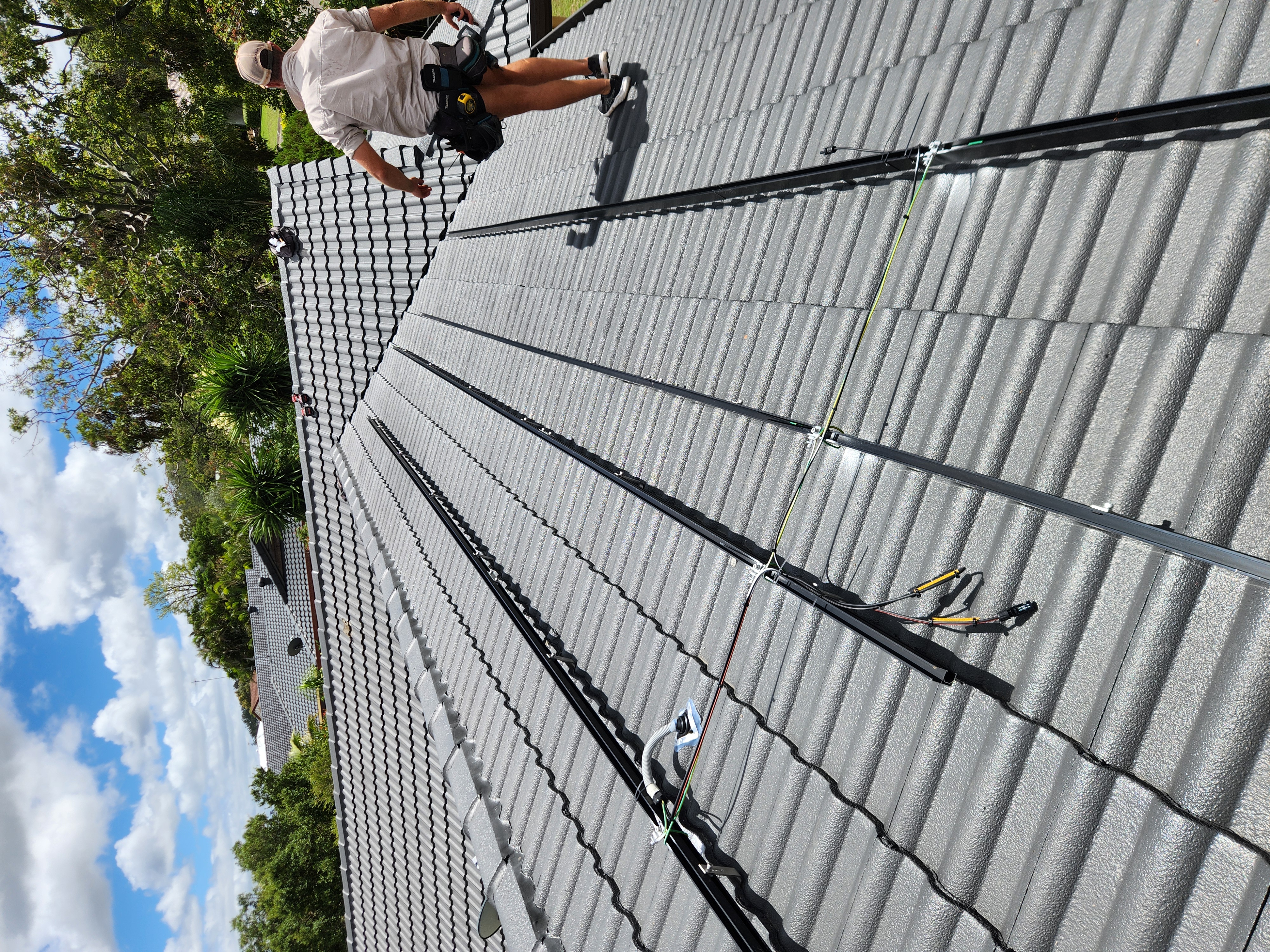 Source Energy Group SAA-accredited installer on rooftop